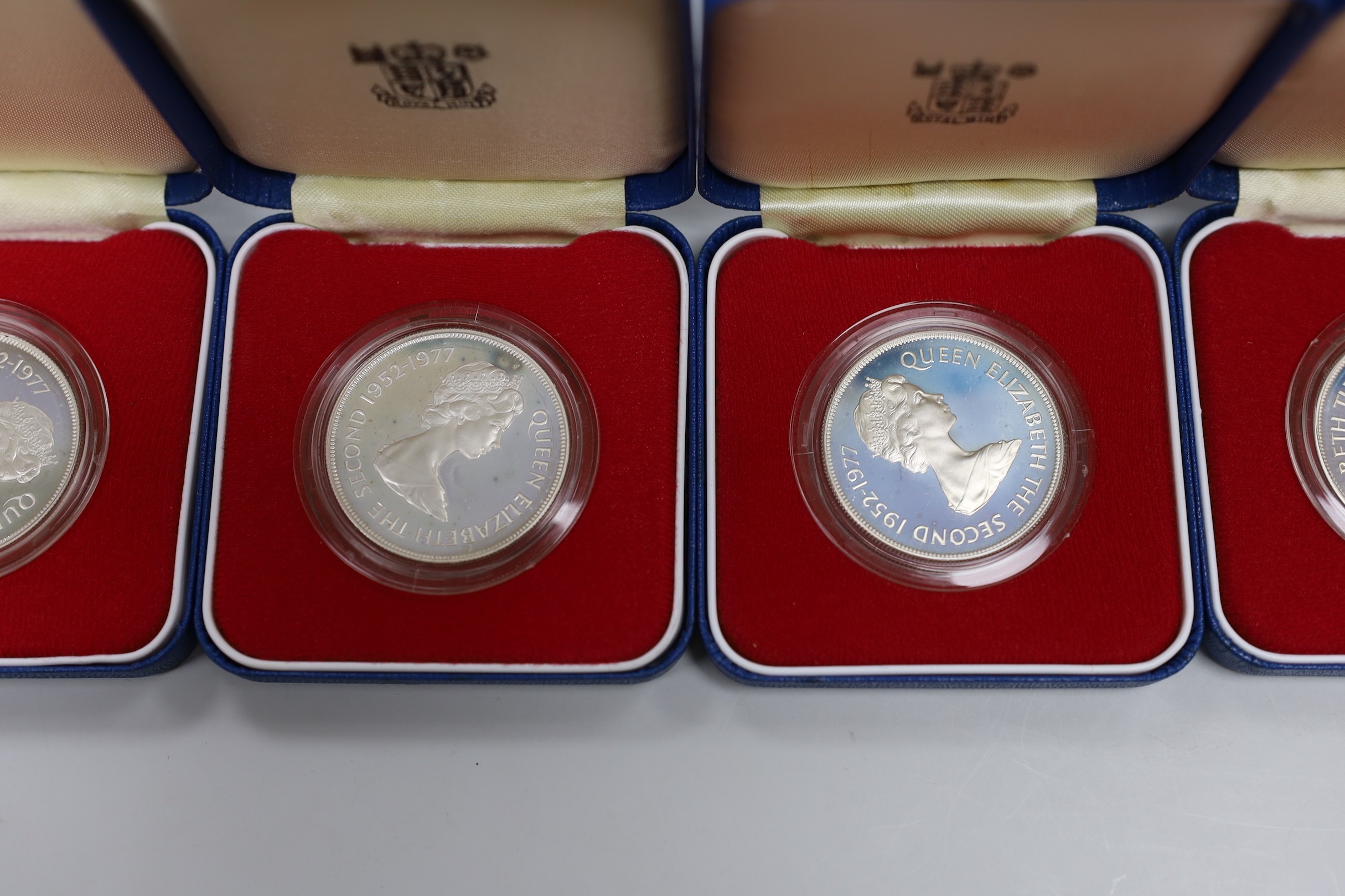 Eight Royal Mint Commonwealth commemorative proof silver crowns